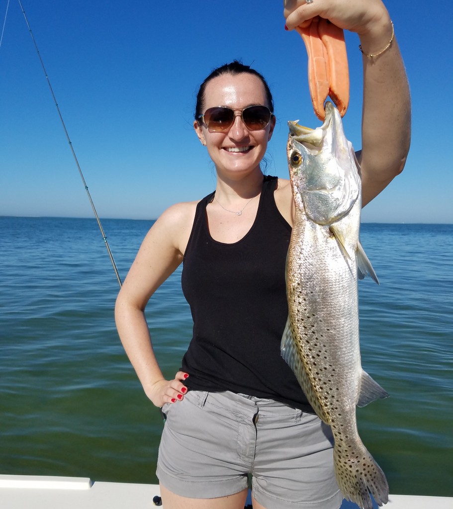 Janice with a trout caught in palm harbor while on vaction in Clearwater beach florida