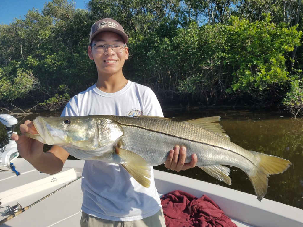 Joey with big snook caught on a safety harbor Fishing charter