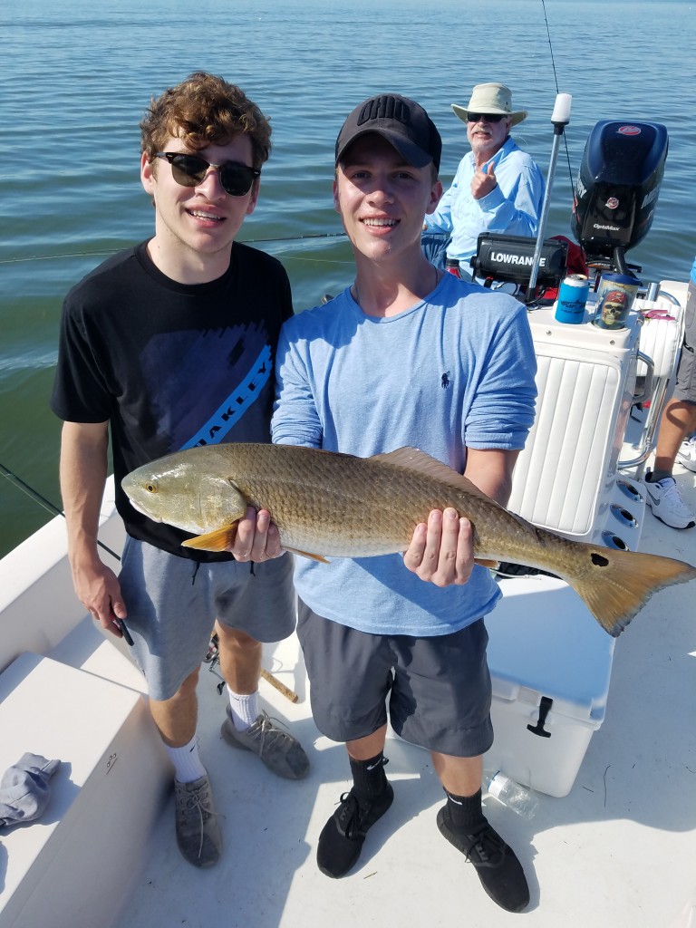 Mike and Johna with a dock cuahg t redfish indian rocks beach fishing charters
