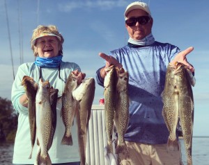 John and Margie with a Tarpon Spring vaction fish and Golf Innisbrook