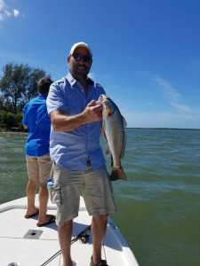 John with redfish Capt Mike coles boat dunedin florida